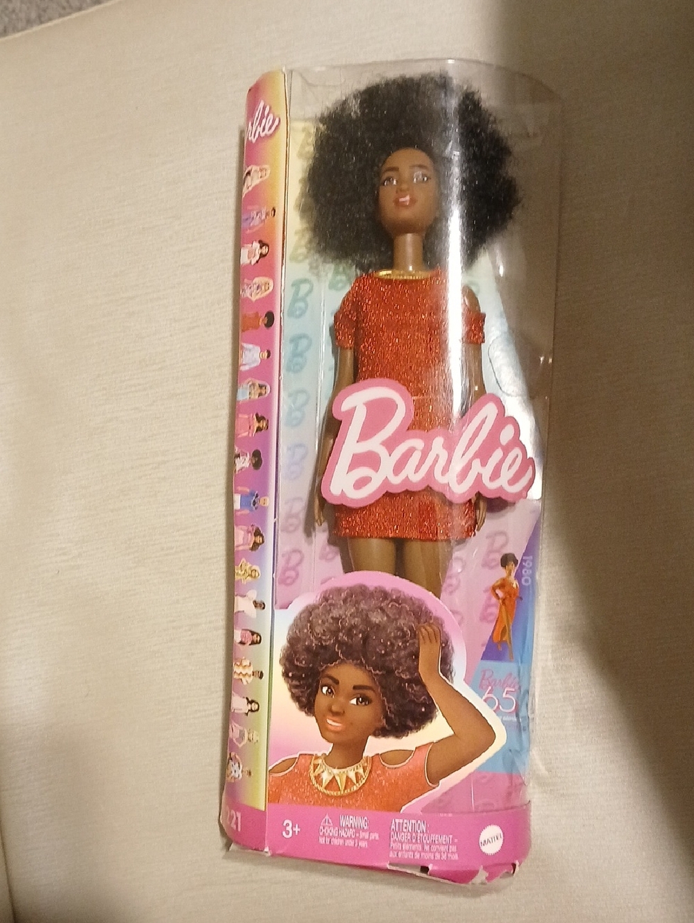 Barbie Doll in Sparkling Orange Dress with Natural Black Hair